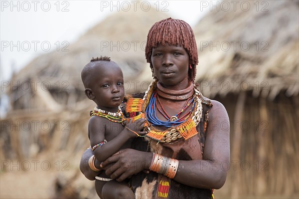 Black woman with child of the Hamar