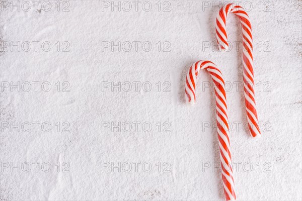 Striped candy canes powdered sugar