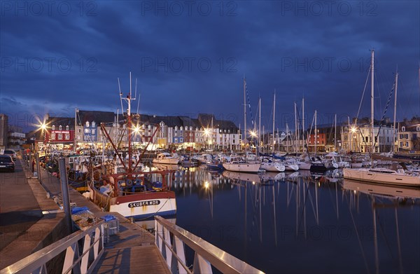 The harbour of Paimpol in the evening during the blue hour