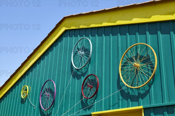 Coloured painted wheels on an art glass in Le Chateau-d'Oleron