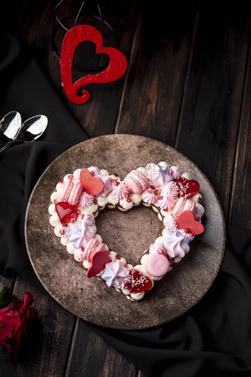 Valentines day heart shaped cake with macarons