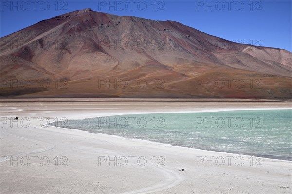 Four-wheel drive vehicle driving on dirt-track along the Laguna Verde