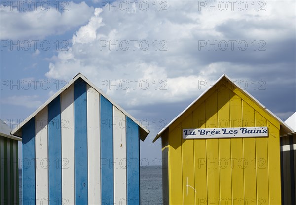 Colourful bathing houses on the beach at La Bree-les-Bains