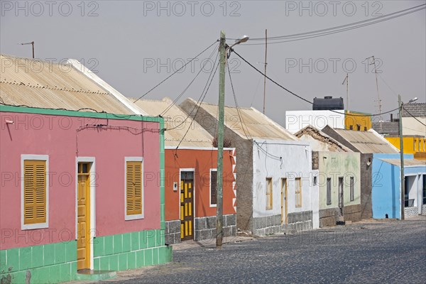 Street with colourful houses in the village Rabil on the island Boa Vista
