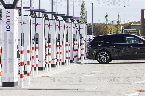 Ionity charging station with car on the A8 motorway near Merklingen