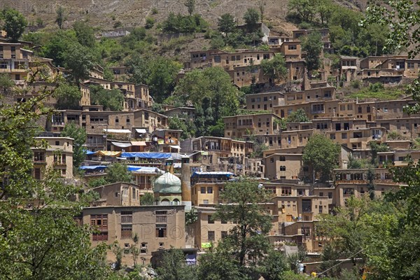 Interconnected houses made of adobe