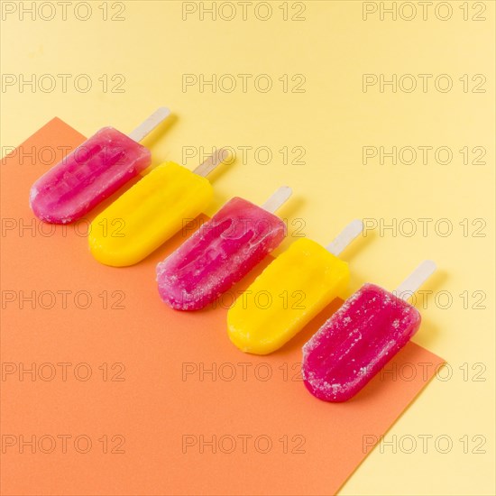 High angle ice cream sticks with flavor