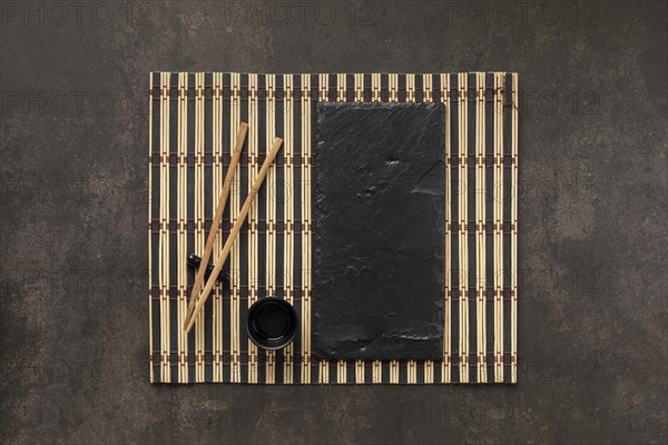 Table assortment with cup sticks flat lay