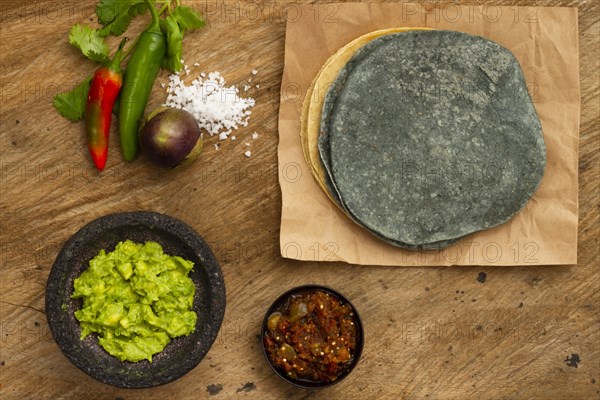 Top view guacamole salsa tortilla