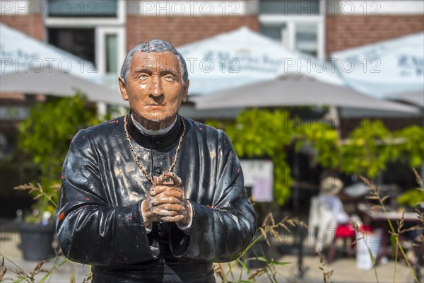 Sculpture of pastor Gerard at the Grotto of St Anthony of Padua in the village Crupet