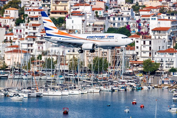 A Boeing 737-700 Smartwings aircraft with the registration OK-SWT at Skiathos Airport