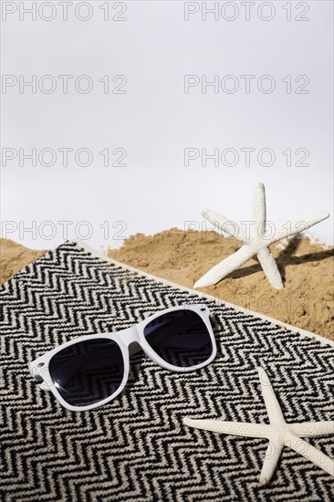 High angle sunglasses starfish