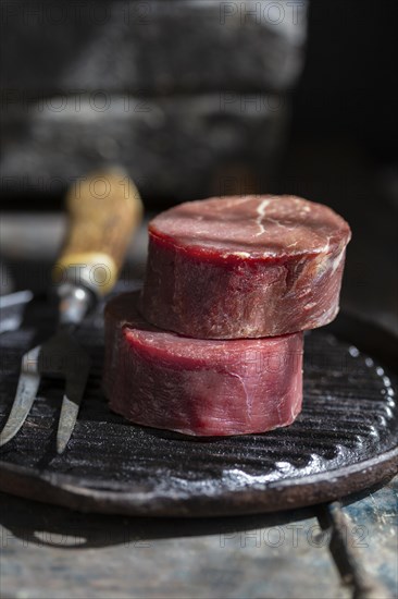 Raw meat plate with fork