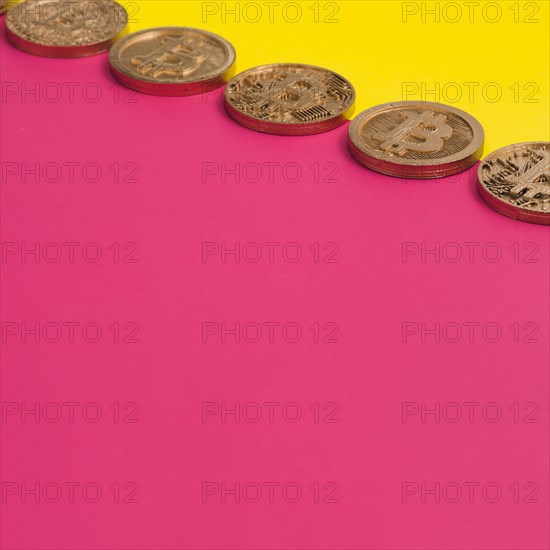 Row many bitcoins yellow pink dual background