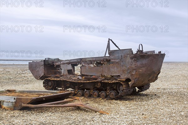 Rusty amphibian vehicle at deserted 1950s Kinnvika Arctic research station