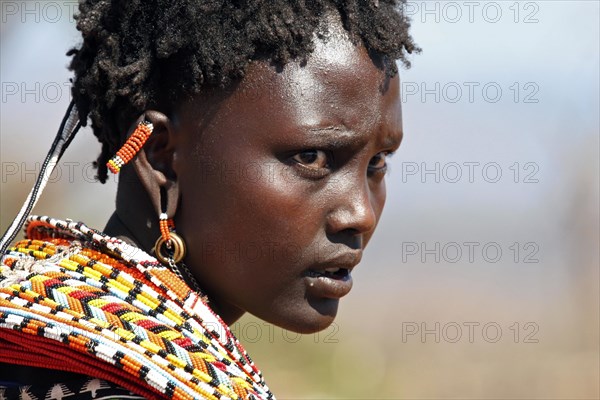 Close up portrait of Samburu woman decorated with colourful beads