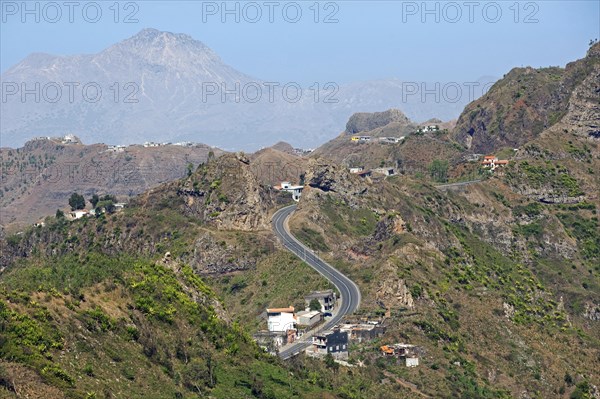 Houses along winding road through the volcanic mountains in the interior of the island of Santiago