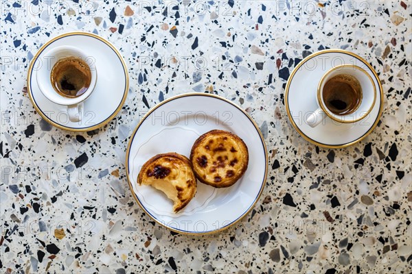 Delicious portuguese pastry named pastel de Belem or pastel de nata typically eaten with expresso coffee