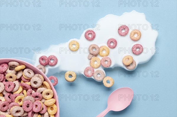 Spilled milk cereals bowl top view