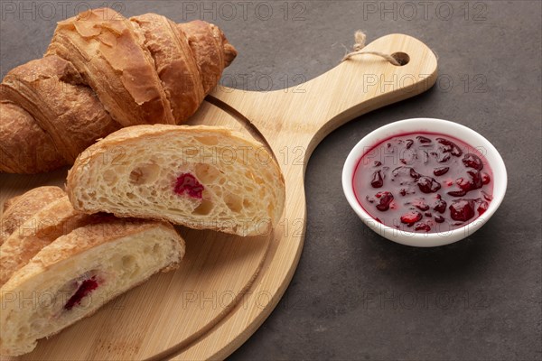 Sweet croissants with jam close up