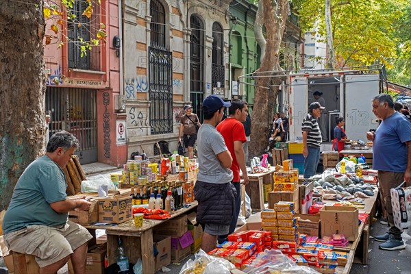 Vendors selling food at Sunday market