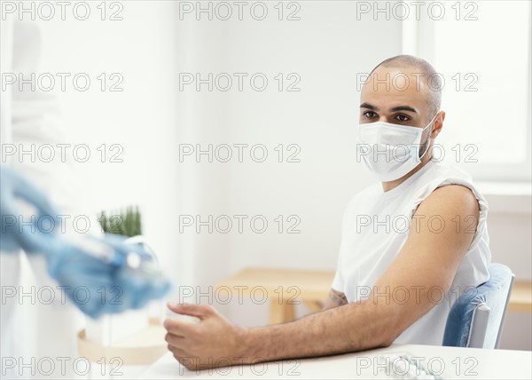 Patient being vaccinated clinic