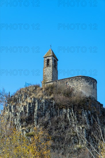 View from below of Brionnet chapel around Saurier village on volcanic peak