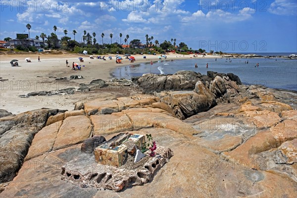 Tourists sunbathing on the Playa Verde beach