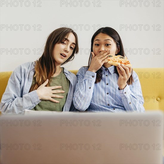 Scared girls watching movie