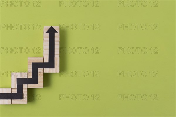 Snake game arrow with wooden outline copy space