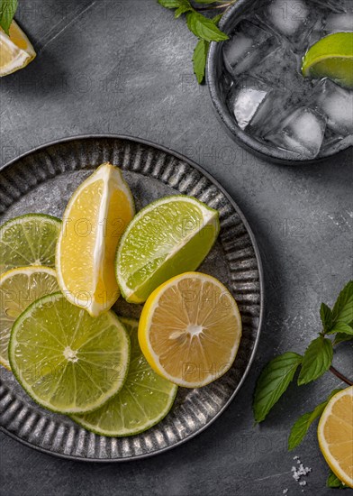 Top view lime lemon slices plate