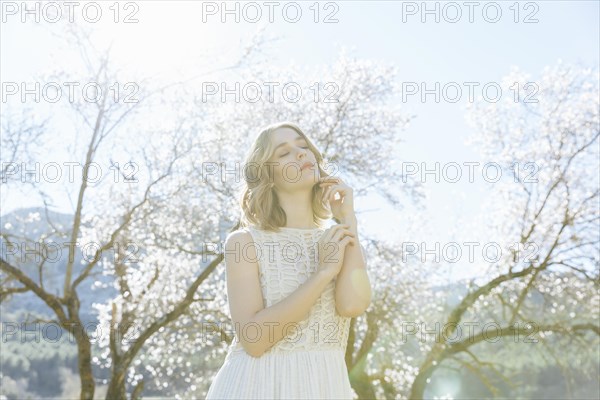 Young woman posing sunlight