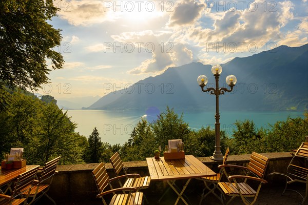 Restaurant Terrace View from The Historical Grandhotel Giessbach with View over Mountain and Lake Brienz with Sunlight in Bernese Oberland