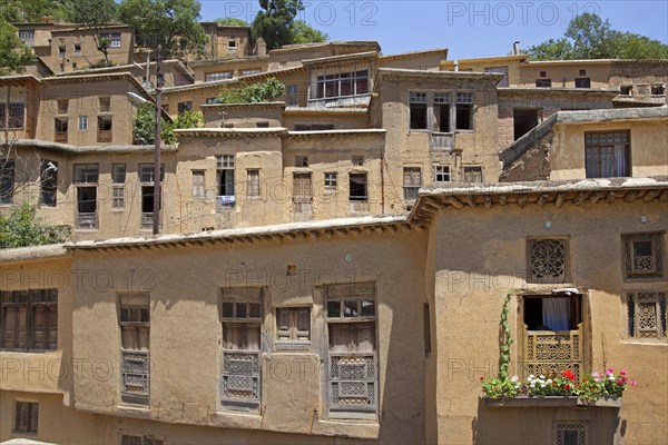 Interconnected houses made of adobe