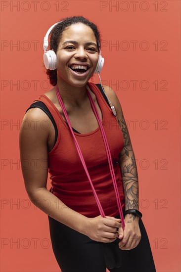 Woman with jumping rope headphones