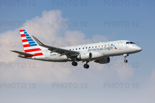 An Embraer 175 aircraft of American Eagle with the registration number N239NN at Dallas Fort Worth Airport