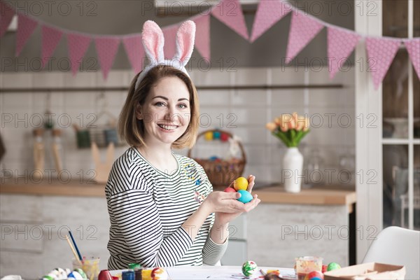 Portrait beautiful mother with bunny ears