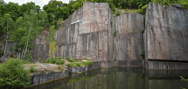 The abandoned red marble quarry Carriere de Beauchateau at Senzeilles in the Belgian Ardennes