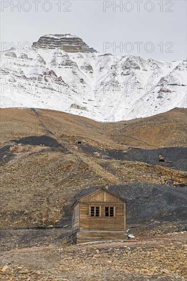 Old wooden hut and adits