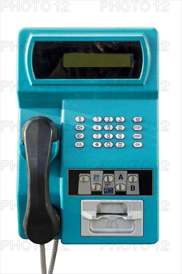 Old public payphone to be used with pre-payment card only in telephone booth from telecom provider against white background
