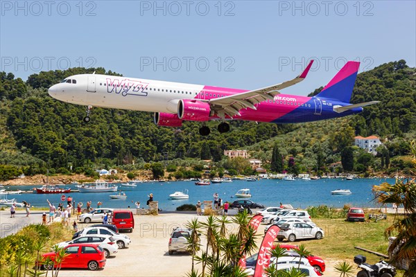 A Wizzair Airbus A321neo aircraft with the registration HA-LZE at Skiathos Airport