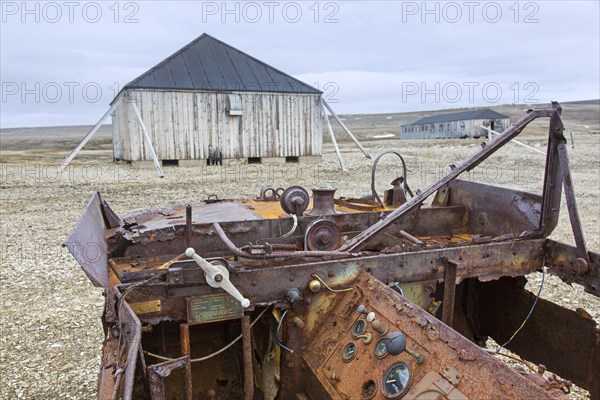 Rusty amphibian vehicle at deserted 1950s Kinnvika Arctic research station