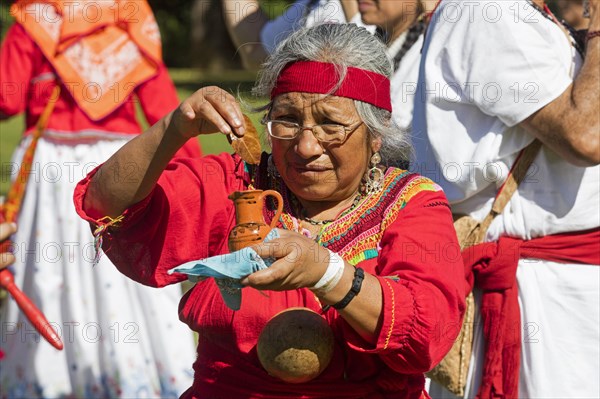 Mexican Ch? ol woman in traditional Maya outfit celebrating the spring equinox at the pre-Columbian Maya civilization site of Palenque