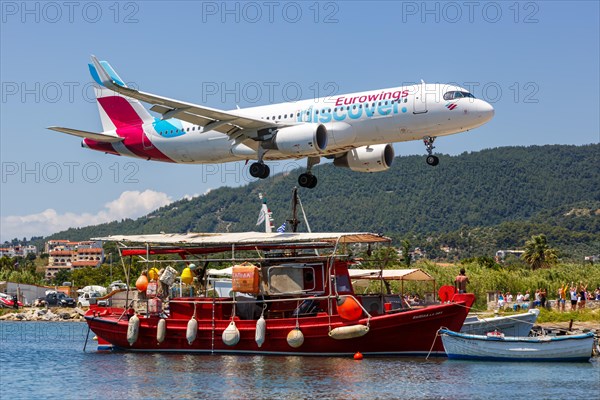 A Eurowings Discover Airbus A320 aircraft with the registration D-AIUY at Skiathos Airport