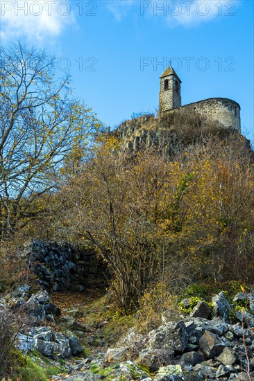 View from below of Brionnet chapel around Saurier village on volcanic peak