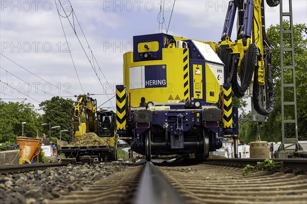 A railway junction is converted to ETCS digital safety technology for the first time. Track foundation train drills holes for the foundations of new signalling frames