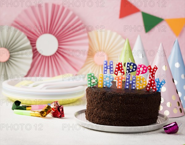 Birthday concept with chocolate cake candles
