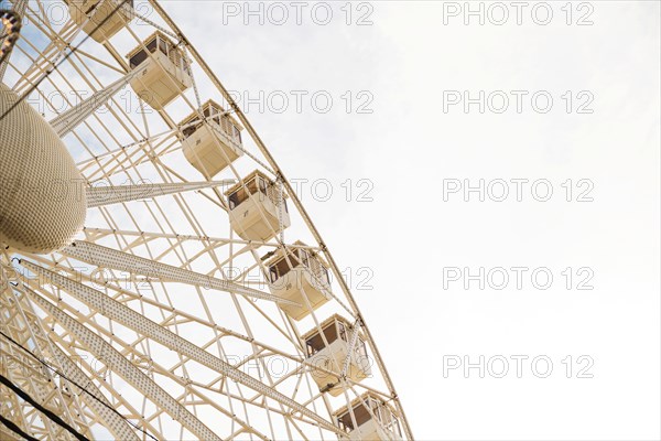 Low angle view large ferris wheel against clear sky