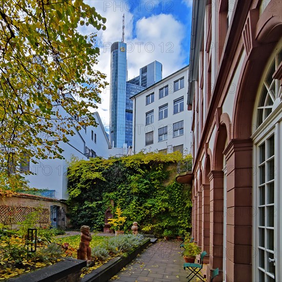 View of the garden of the Goethe House with Commerzbank Tower