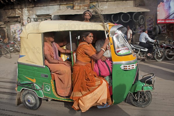 Fully loaded autorickshaw